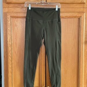 Danskin Dark Olive Leggings size medium 
Side pockets